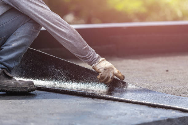 Professional Emergency Waterproofing technician working in Ghent, KY